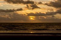 Zonsondergang op zee