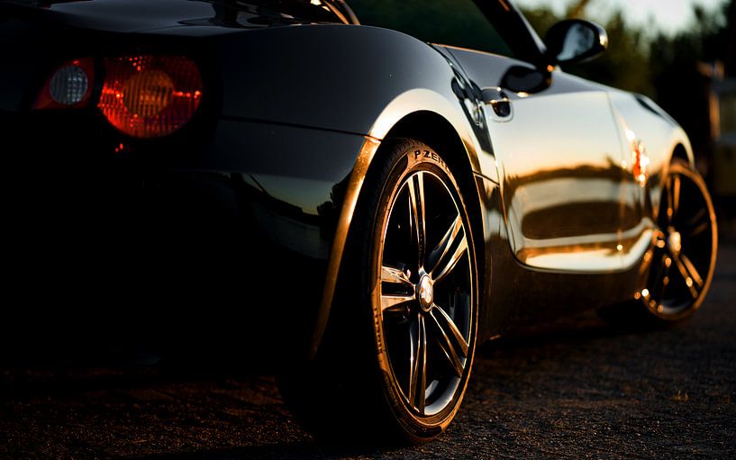 les reflets du coucher de soleil sur ma voiture par Henri van Rheenen