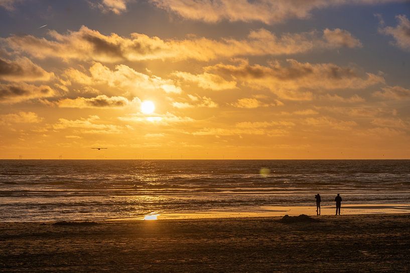 Couple in sunset by Michael Ruland