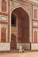 Father and son at tomb.
