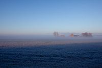Ferme dans la brume du matin