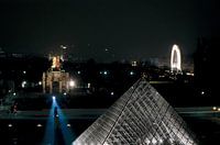 Louvre Pyramid and Champs-Elysées seen from the rooftops at night 8_4