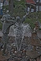 Figuren-Kinder am Springbrunnen in Lüneburg