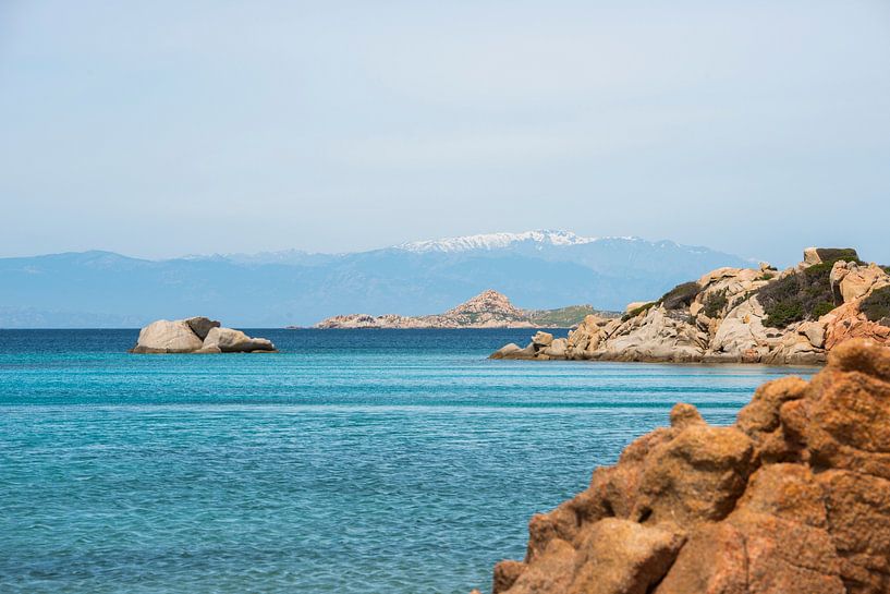 the beautiful island of maddalena , compared with the maledives, with blue sea and the mountains as  by ChrisWillemsen