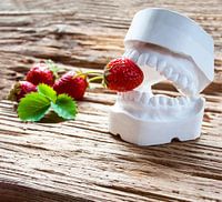 Bite with fresh strawberries for a healthy diet