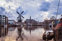 View of the Spaarne of the Adriaan windmill and the Grote Kerk (Haarlem, Holland)