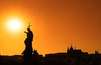 Sunset silhouettes of Charles Bridge in Prague