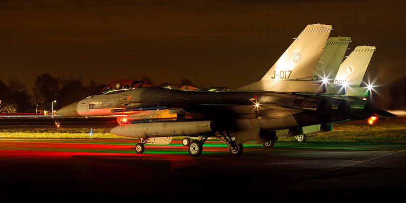 F-16's preparing for a night mission by Arjan van de Logt