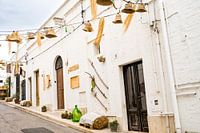 Italian street life in Alberobello Puglia Italy
