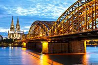 Cologne, Germany - August 3, 2021: Cologne Cathedral skyline and Hohenzollern Bridge with river Rhin