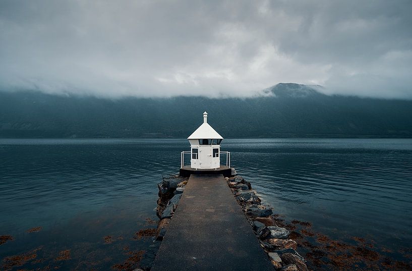 Lighthouse in a fjord on a rainy day, Norway by qtx