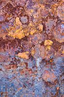 Red blue rust textures on an old boat