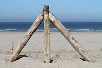 Houten hek op het strand