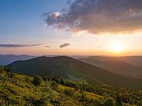 The setting sun over the Vosges mountains in France