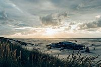 Sun breaks through the clouds at the beach of Midsland aan Zee
