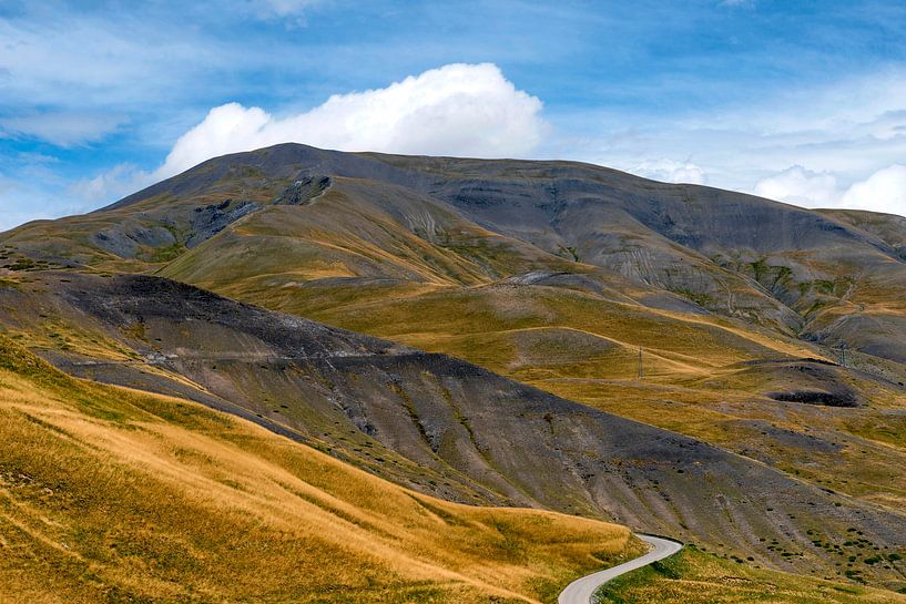 winding road through golden mountains to the Col de Vars by Hanneke Luit