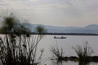 Vissers en nijlpaarden in Uganda.