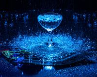 Glass in the rain, with blue light.