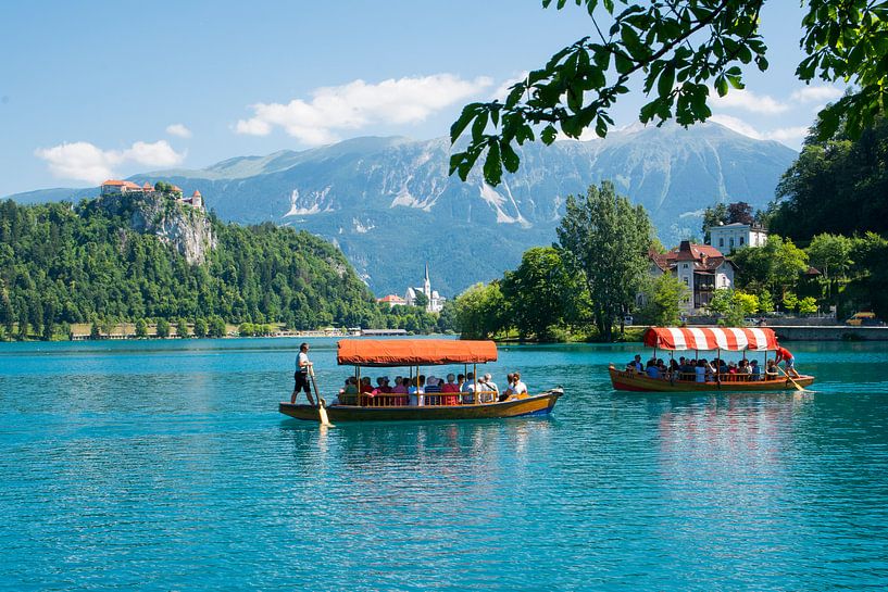 Boats on the lake Bled in Slovenia by Lifelicious