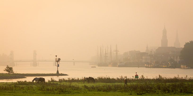 City front of Kampen in the fog. by Evert Jan Kip