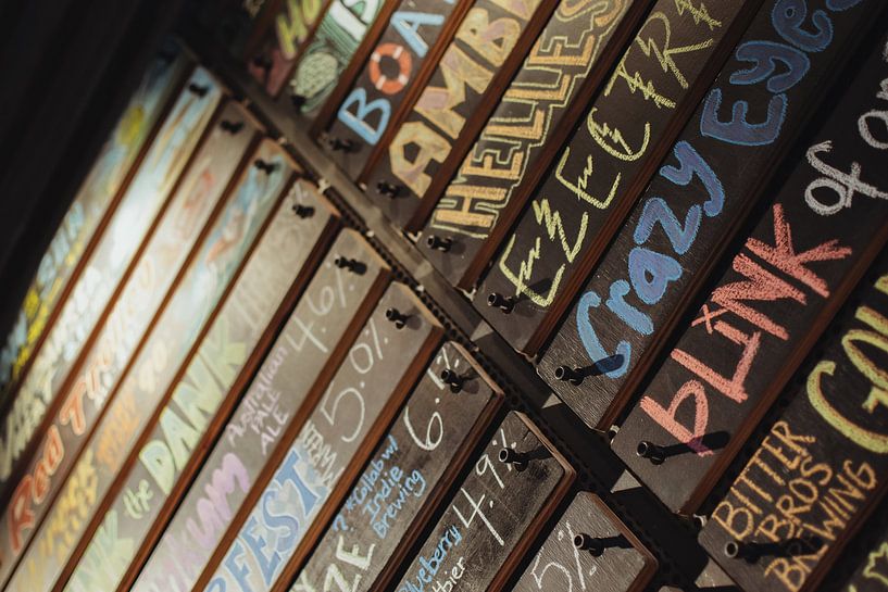 Colored beer choice on wood | Travel photography fine art photo print | California, U.S.A. by Sanne Dost