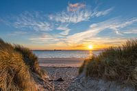 Setting sun at the dune crossing Borssele