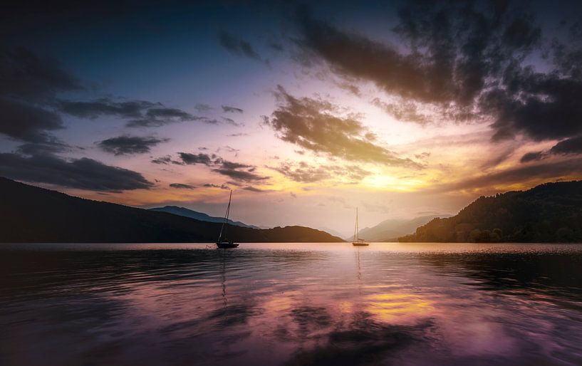 Boats in a mountain lake of Austria by Joost Lagerweij