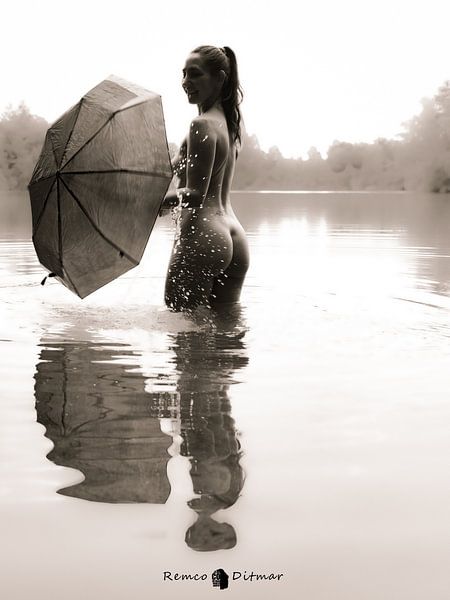 Woman in the water by Remco Ditmar