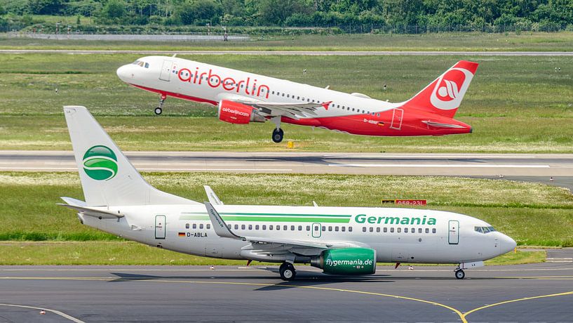 Germania Boeing 737 and Air Berlin Airbus A320. by Jaap van den Berg